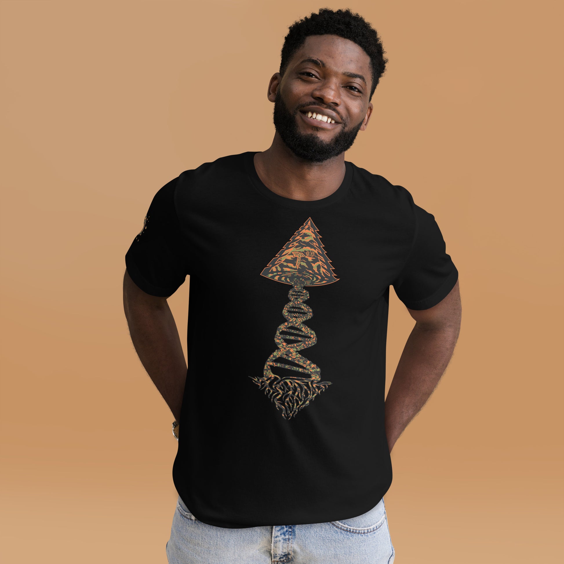 Tango Tree Of Life t-shirt featuring a vibrant design worn by a smiling man on a neutral background.