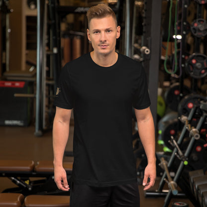 Unisex t-shirt Shroomverse Compass in black worn by a man in a gym setting, showcasing fit and style.