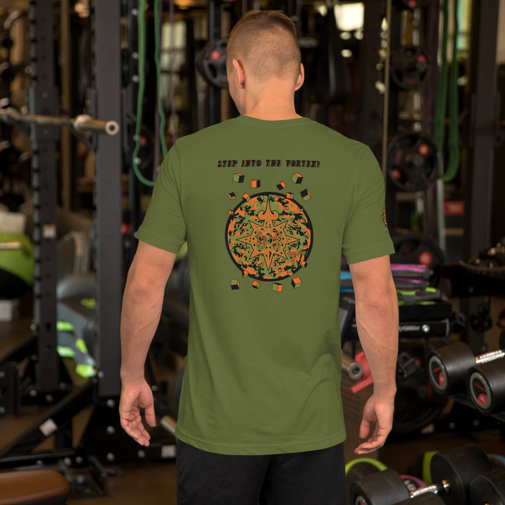 Unisex t-shirt Shroomverse Compass featuring a graphic design, worn by a man in a gym setting.
